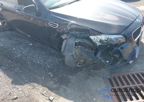 2013 BMW M5 z USA, uszkodzony, nr VIN WBSFV9C5XDC773174